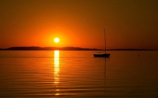 Boat sunset water mountain moon - the distance behind free wallpaper