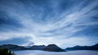 Mountain range clouds starry sky - low free wallpaper