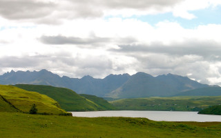 Mountainous horizon ocean landscape cloudy - a large body of water free wallpaper