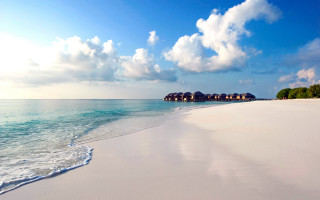 Beach huts waves sky mountains - wave free wallpaper