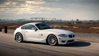 White sports car desert cloudy - a cloudy sky in the background free wallpaper