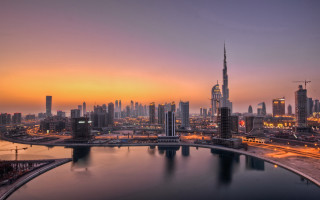 City skyline bridge river sunset - orange sky free wallpaper