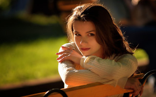 Serious woman bench brown eyes - a bench free wallpaper