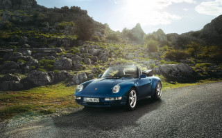 Blue sports car rocky hillside - exekia free wallpaper