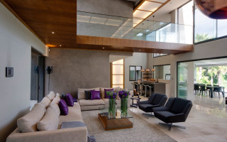 Living room couch chairs staircase - open ceiling free wallpaper