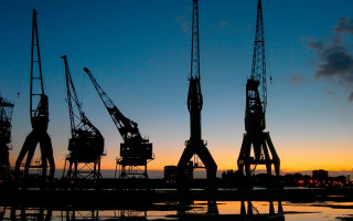 Cranes beach sunset cityscape silhouette - constructivism free wallpaper