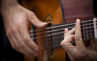 Guitar player hands neoplasticism blurry - a person playing free wallpaper