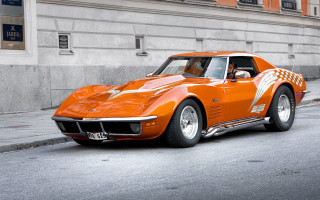 Orange sports car clock tower - ed roth free wallpaper