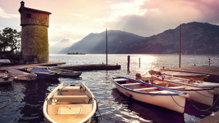 Boats tower building clock landscape - a couple of boats free wallpaper