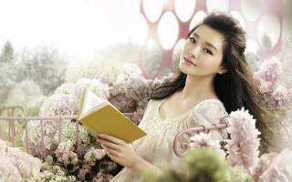 Woman white dress holding book 2 - a white dress holding free wallpaper