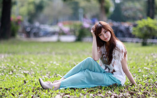 Woman park sitting white shirt - blue skirt free wallpaper