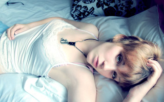 Gothic photorealistic woman bed blonde - a white lingerie free wallpaper