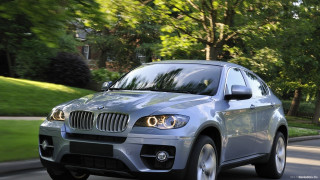 Silver bmw suv driving park - a street next free wallpaper