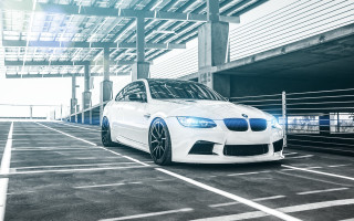White car parking lot cityscape - a parking lot next free wallpaper