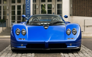 Blue sports car salon building - focus free wallpaper