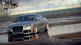 Silver car wet road fence - a wet road next free wallpaper