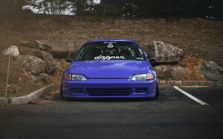 Blue car parked rock wall - a.d.m. cooper free wallpaper