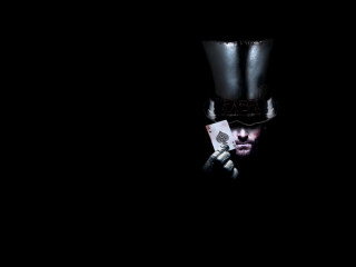 Man top hat holding card - his mouth and a cigarette free wallpaper