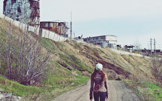 Woman walking dirt road suitcase - a dirt road free wallpaper