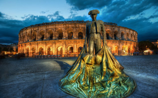 Neoclassical bronze statue clocktower night - a statue of a man free wallpaper