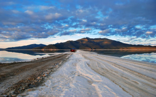 Truck lake mountains cloudy sky - a road next free wallpaper
