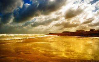 Beach waves cloudy sky cityscape - a few wave free wallpaper
