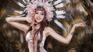 Woman headdress feathers fashion photorealistic - a picture free wallpaper