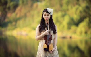 Woman violin lake trees magic - a forest in the background free wallpaper