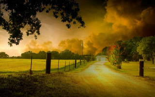 Dirt road gate field clouds - a dirt road free wallpaper