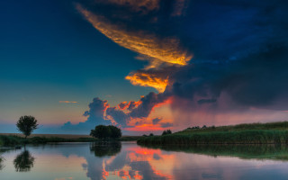 Clouds lake sunset cityscape mountains - a large cloud free wallpaper