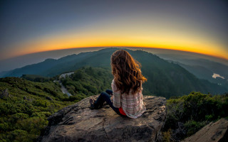 Woman sitting rock sunset valley - sunset free wallpaper