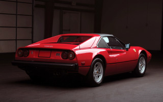 Red sports car garage black 4 - a white wall behind free wallpaper