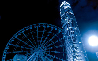 Ferriswheel tallbuilding nightlight fireworks fullmoon - a ferris wheel free wallpaper