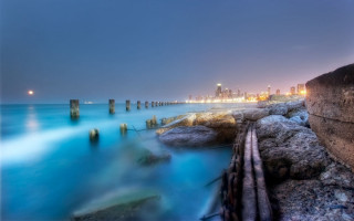 City skyline ocean night long - a matte painting free wallpaper