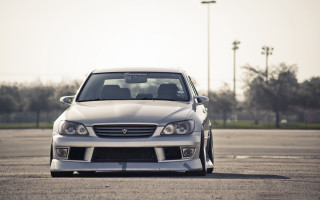 White car parking lot trees 2 - andrew bell free wallpaper