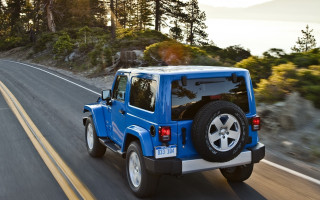 Blue jeep driving forest hillside - hillside free wallpaper