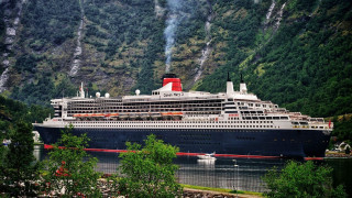 Cruise ship bay mountain forest - a boat free wallpaper