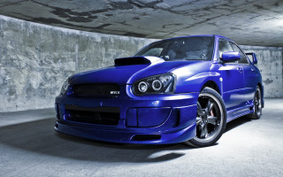 Blue car parking garage concrete - a concrete floor free wallpaper