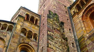 Tall brick building clock roman - grotesque free wallpaper