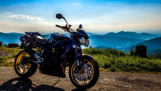 Mountain road motorcycle valley sky - a view of the valley below free wallpaper