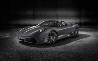 Grey sports car dark room 3 - a white wall behind free wallpaper