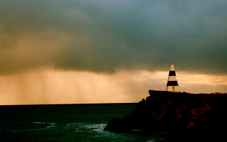 Lighthouse cliff stormy sky lightning - stormy weather free wallpaper