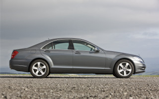 Silver car mountain gravel clouds - a silver car free wallpaper