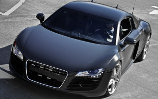 Black car parked person looking - a black car free wallpaper