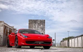 Red sports car building clouds 2 - f 8 aperture free wallpaper