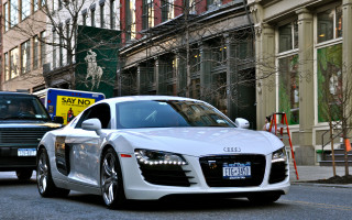 White car black truck cityscape - clean free wallpaper