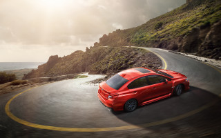 Red car ocean mountain sunny - winding free wallpaper