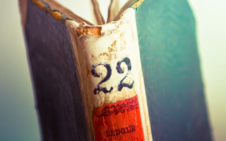 Hanging book blue background white - a number free wallpaper
