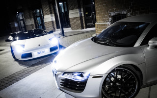 White sports cars night cityscape - intimidating lighting free wallpaper