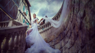 Woman white dress stone staircase - the wind free wallpaper